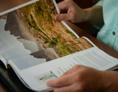 person holding magazine